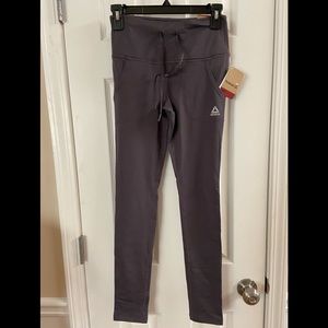 NWT purple Reebok leggings with pockets size XS